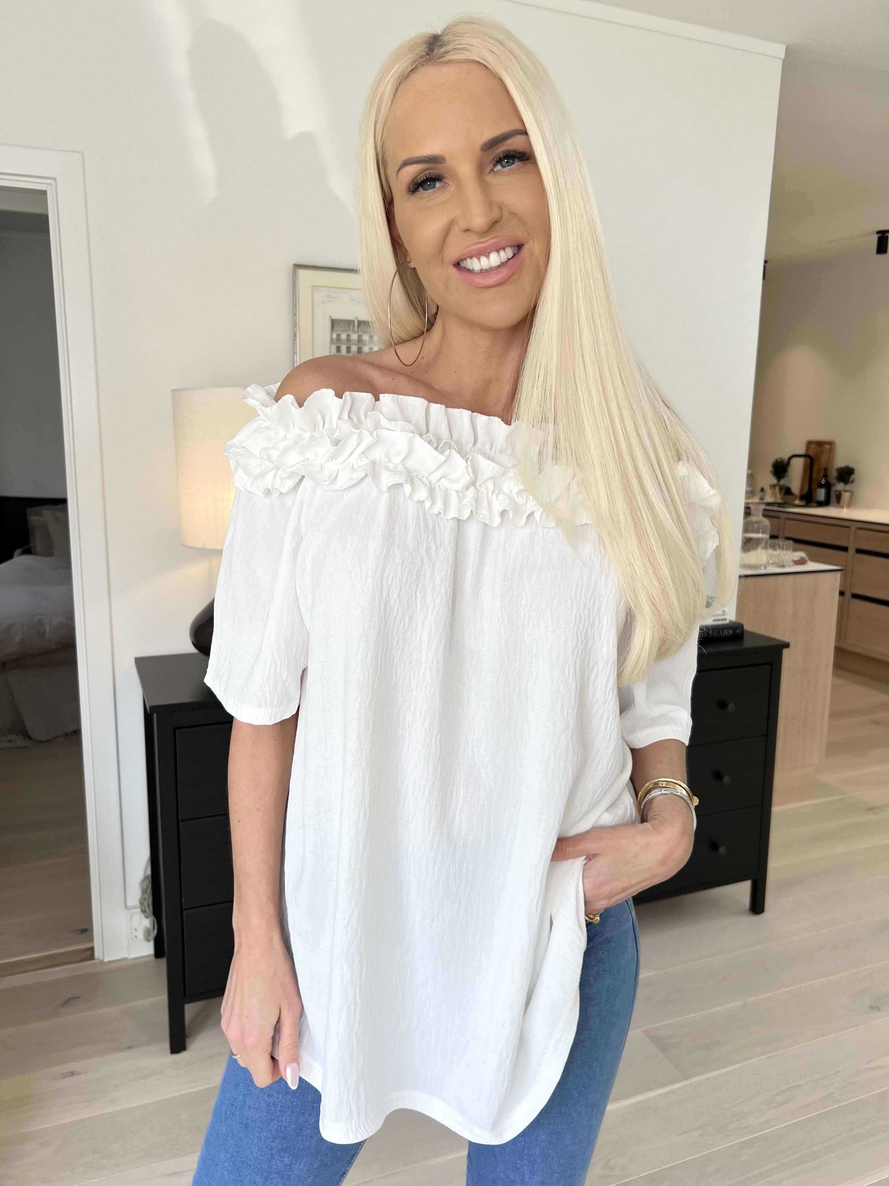 Chili Sleeveless - Finaste tunika med resår och volang i halsen